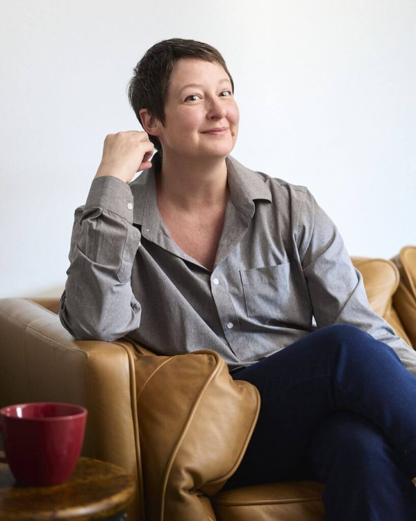 Headshot photo of content writer Ashley Hanamann